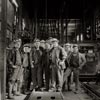 photograph of group of coal miners at pit head 1990